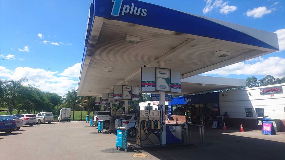 Dirty petrol station canopy in Johannesburg before cleaning
